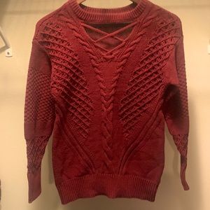 It is a size extra small from the brand Maurices.